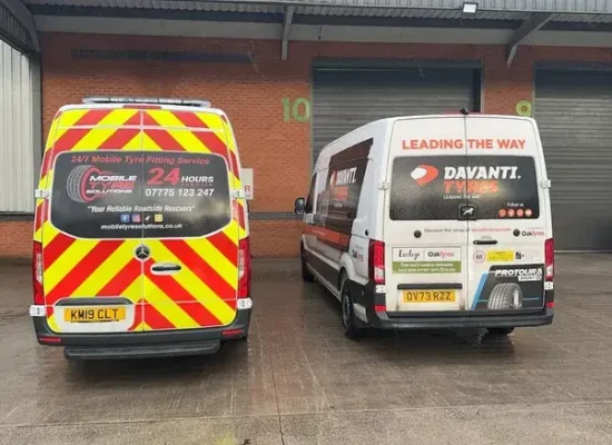 Emergency mobile tyre replacement technician replacing flat tyre at home